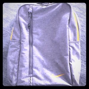 Nike full size grey and yellow backpack